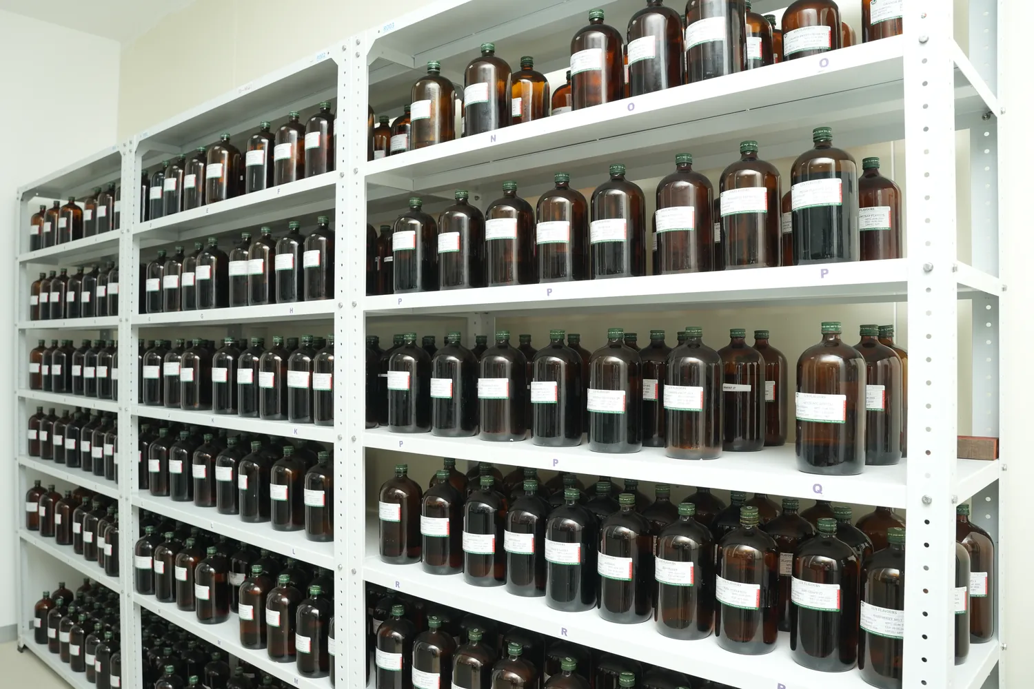 Amber bottles of liquid flavour standards in the Lux flavour library